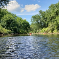 A photo of some kayakers on the Tunungwant Creek during the 2021 Tame the Tuna Regatta
