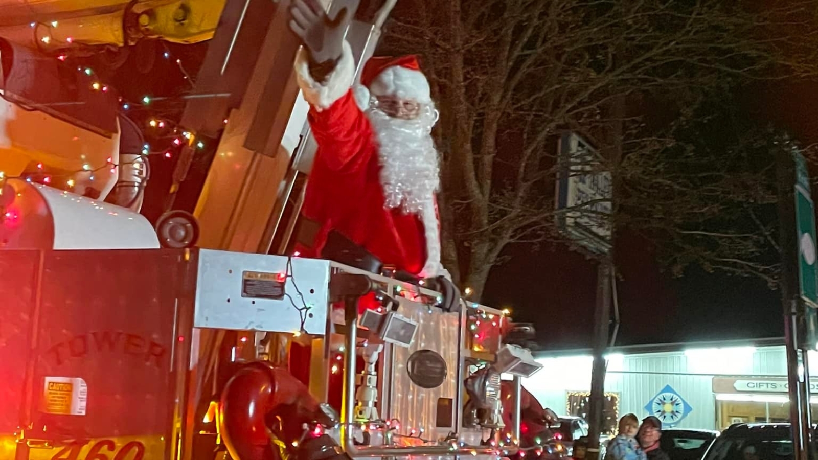 Santa waving during parade in Randolph