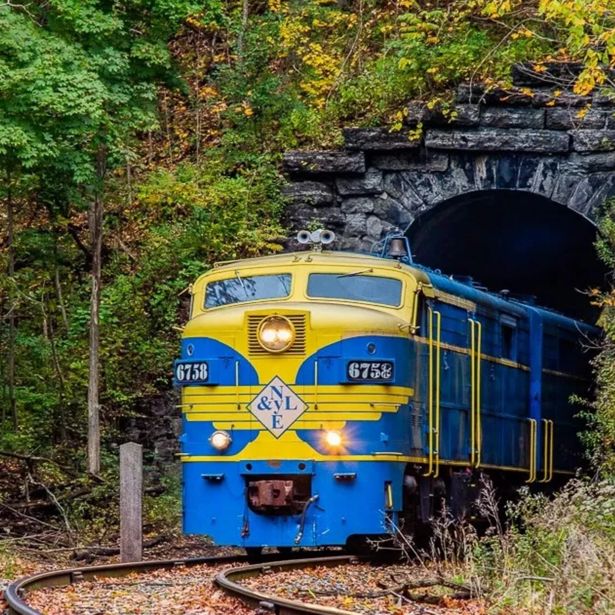 NYLE Train coming through the tunnel