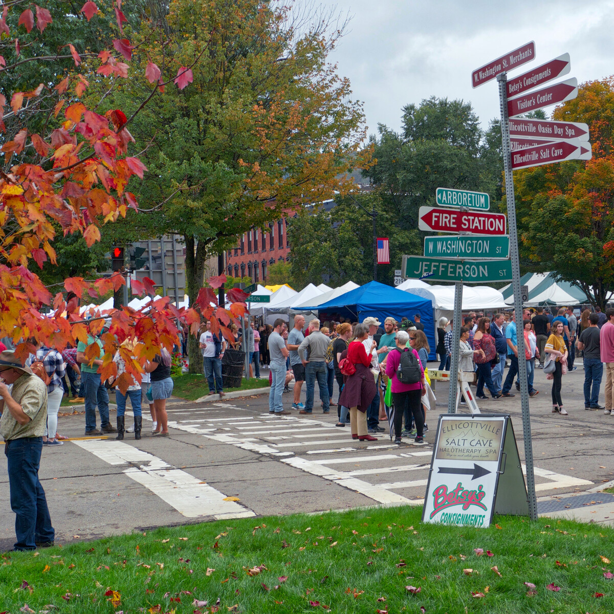 Street view from the north west of people and vendor tents at the 2018 Ellicottville Fall Festival