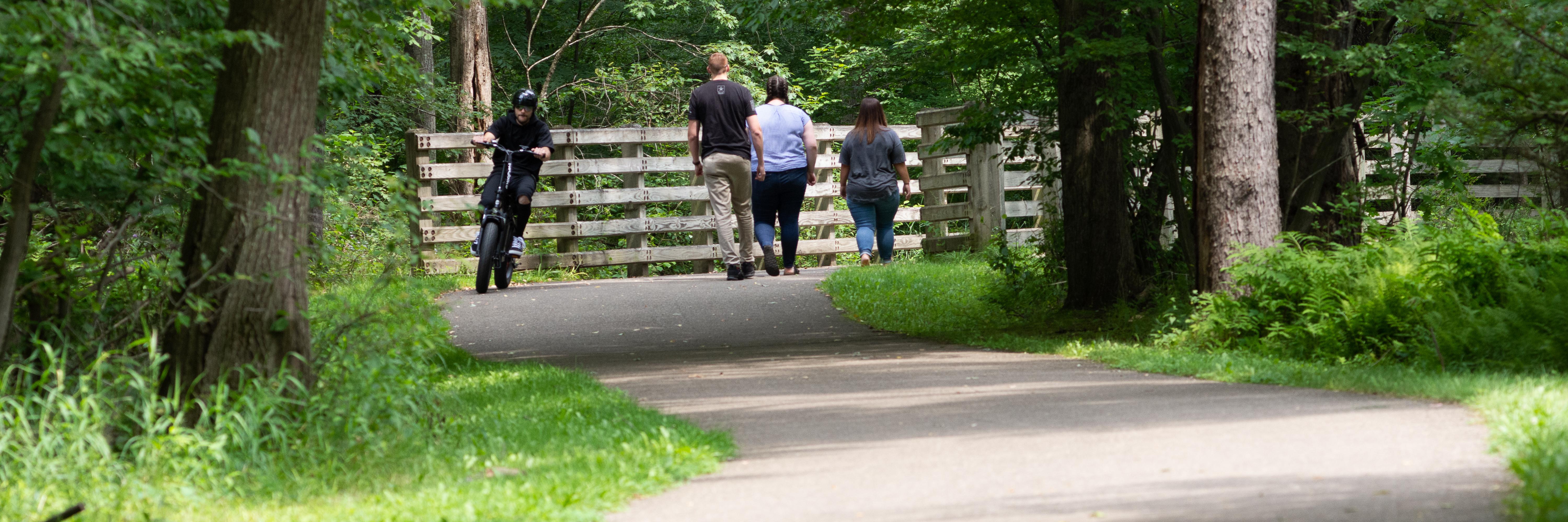 Bicyclist and walkers on the Allegheny River Valley Trail