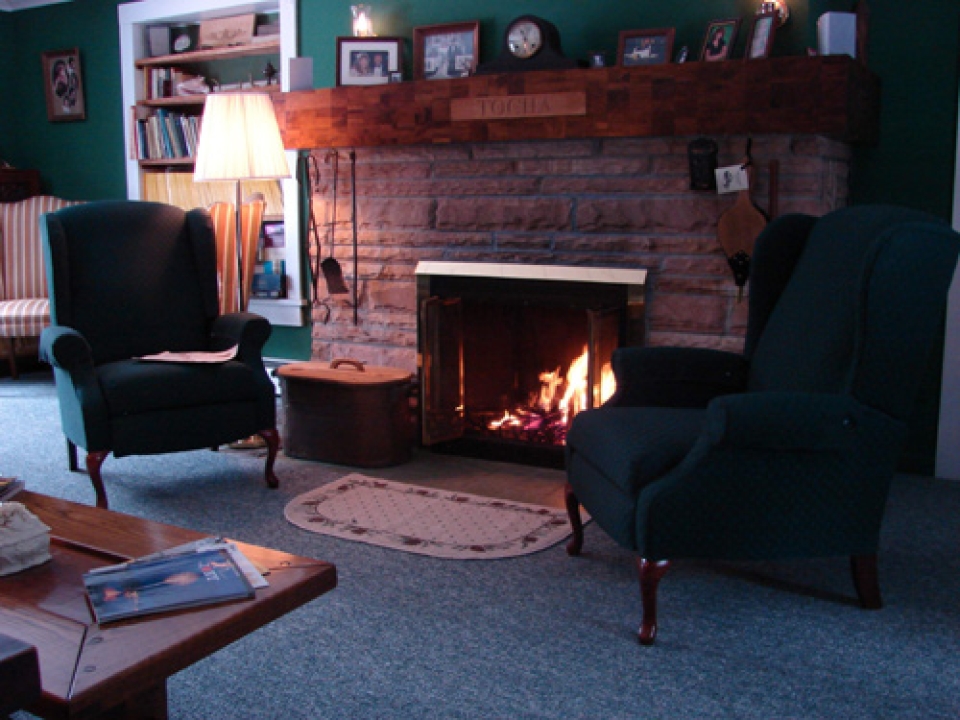 inside by the fireplace