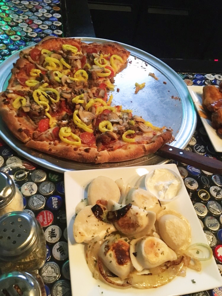 Pizza and perogies from The Broken Wing Pizzeria and Grille