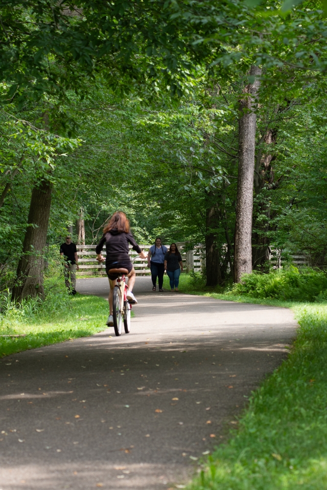Walkers and bicycler on the Allegheny River Valley Trail