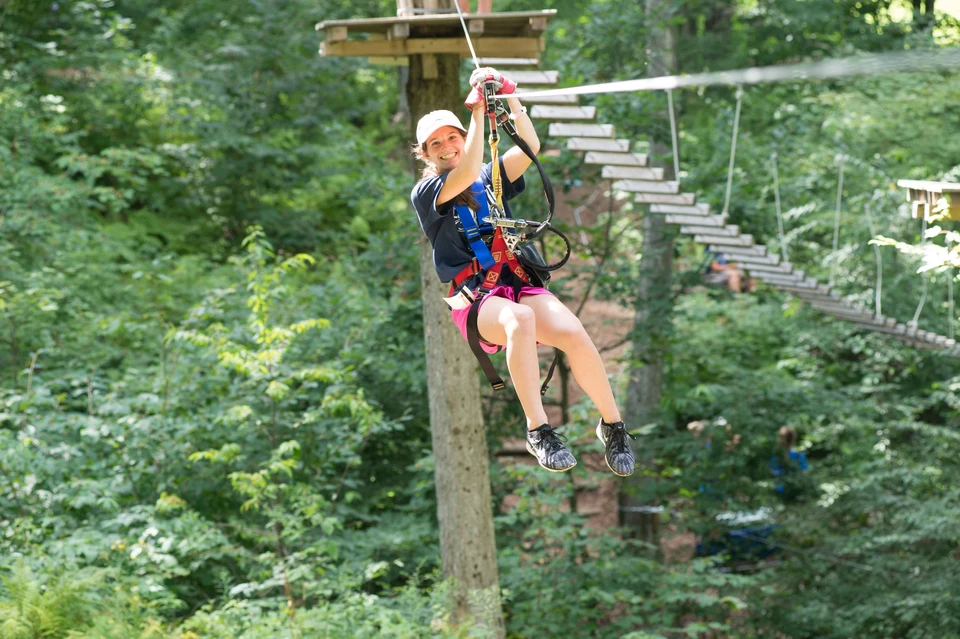 Person on a zipline at Sky High Adventure Park