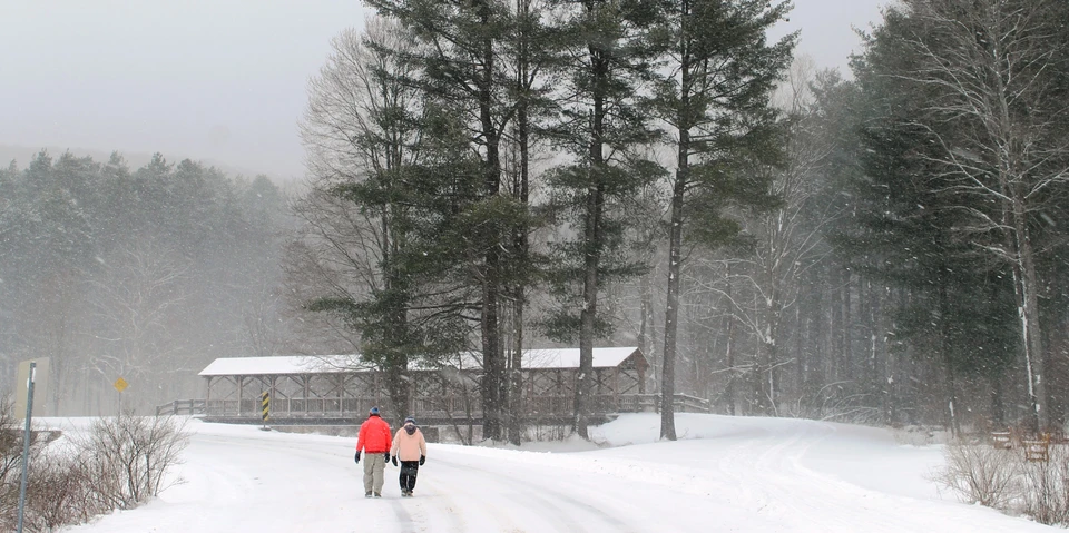 Walking by the covered bridge at Allegany State Park