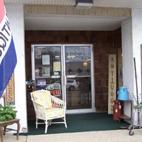 Entrance to Co-Op Yesterday & Today