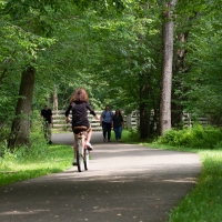 Walkers and bicycler on the Allegheny River Valley Trail