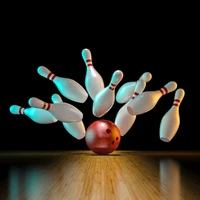 Bowling ball hitting bowling pins