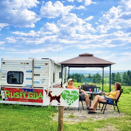 Couple enjoying camping at Perfectly Blended Farm