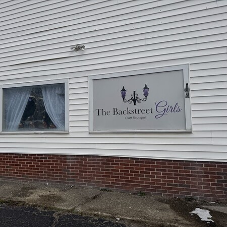 Backstreet Girls sign