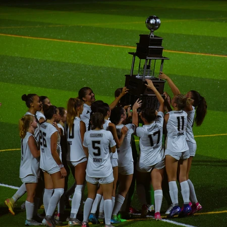 2025 NY Corporate Cup Team with their Trophy