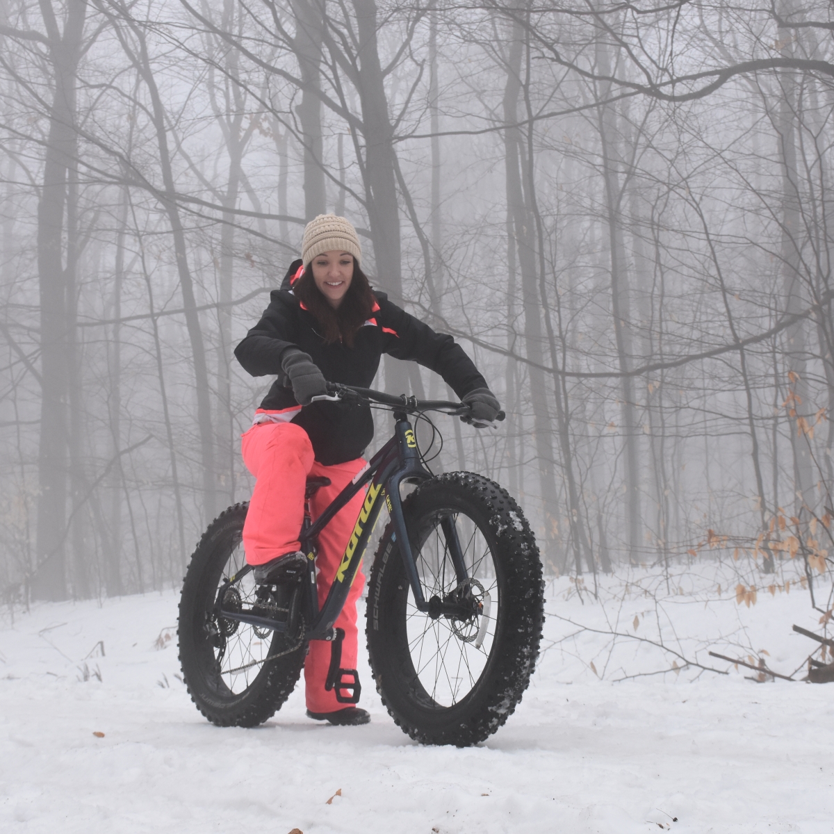 Danna on a fat bike in Winter at Allegany State Park