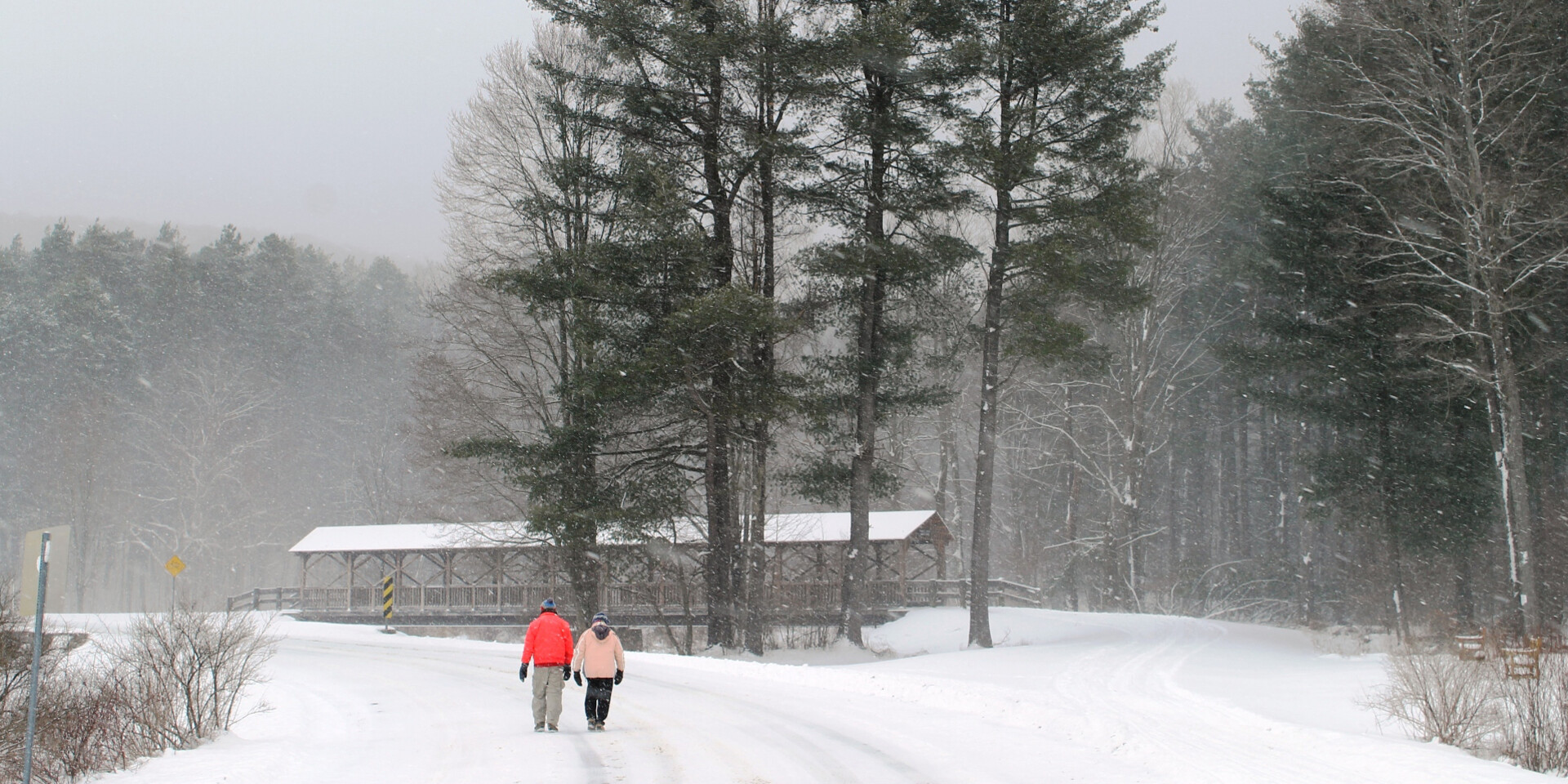 Walking by the covered bridge at Allegany State Park