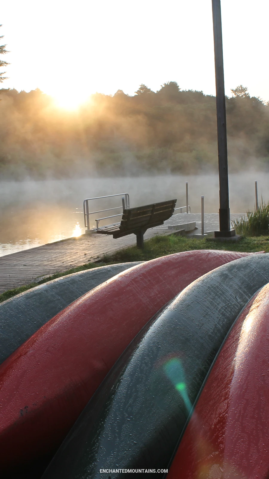 Canoes in rest on the shores of Red House Lake