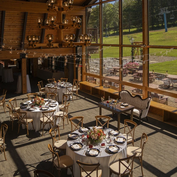 Tables and chairs set for an event at HoliMont