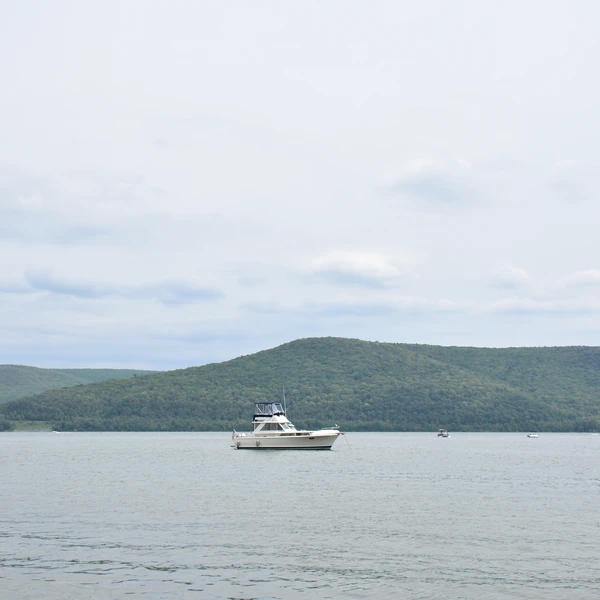 Boat anchored by Onoville Marina Park