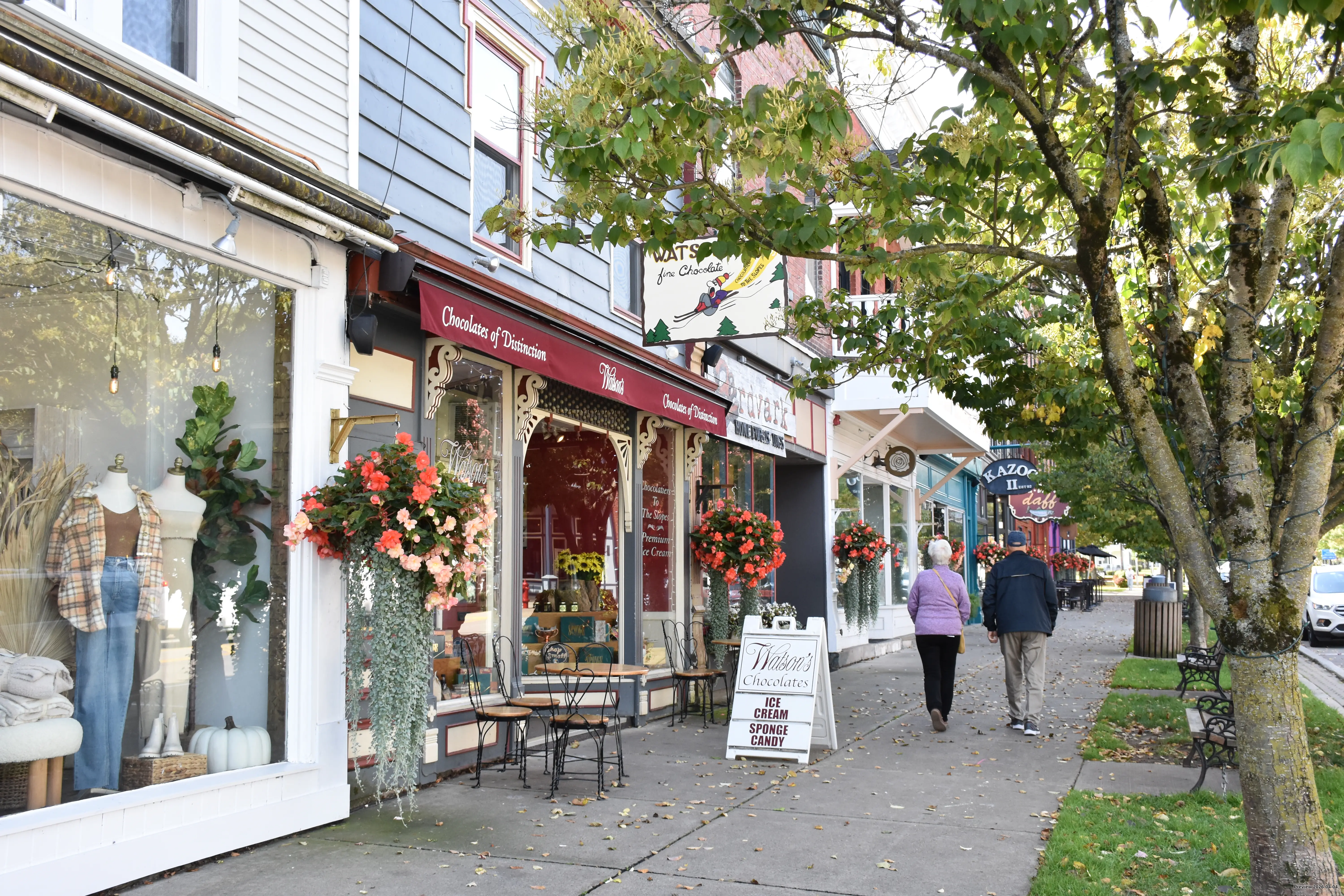 Couple walking outside of Watson's Chocolates in Ellicottville