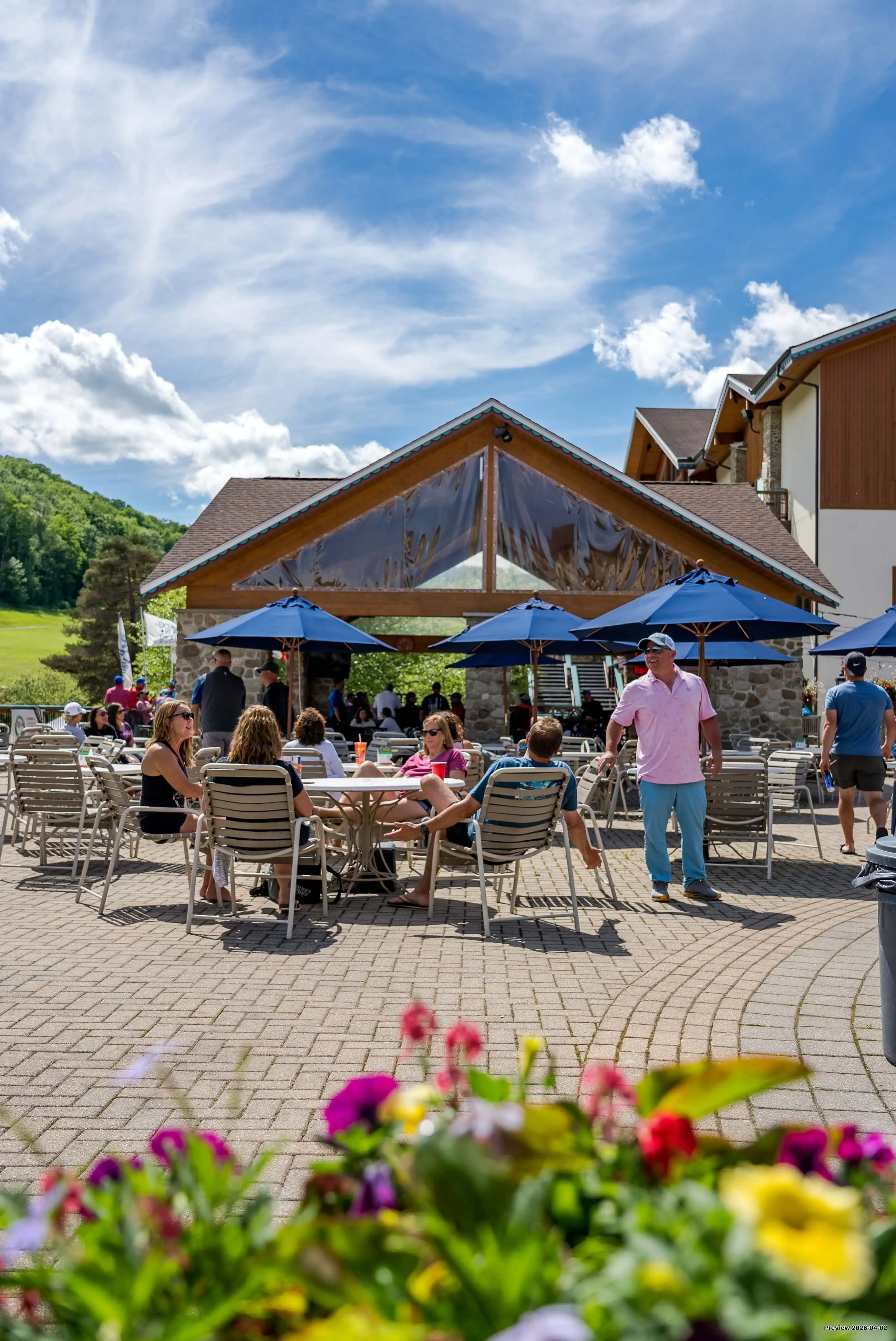 Crowd enjoying a summer evening at the Cabana Bar at Holiday Valley Resort