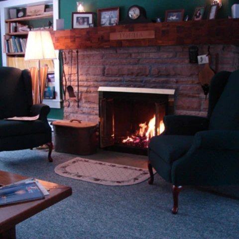 inside by the fireplace