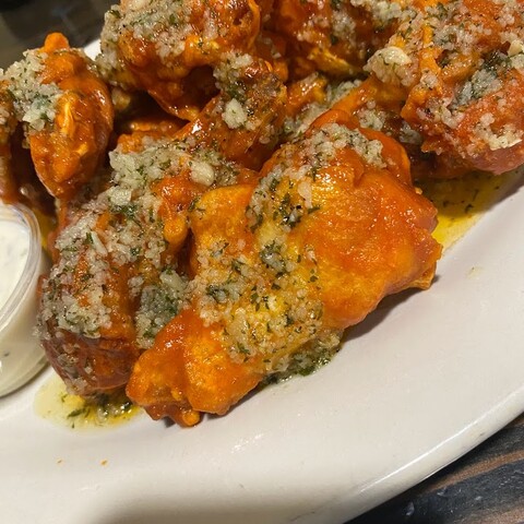 Hot Garlic Parm Chicken Wings from Hughes Hotel