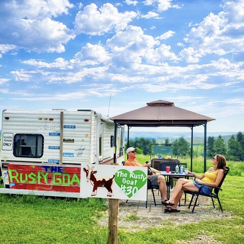Couple enjoying camping at Perfectly Blended Farm