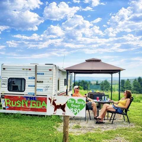 Couple enjoying camping at Perfectly Blended Farm