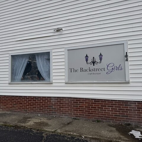 Backstreet Girls sign