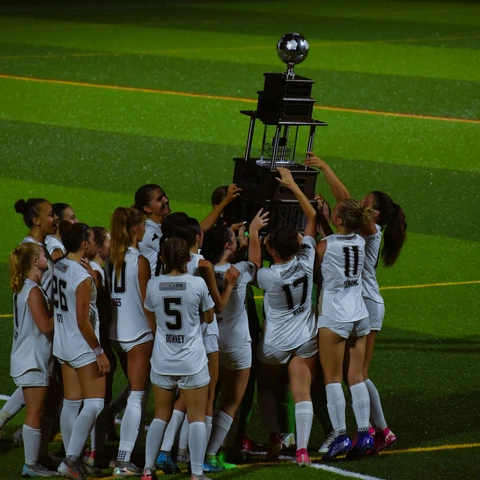 2025 NY Corporate Cup Team with their Trophy