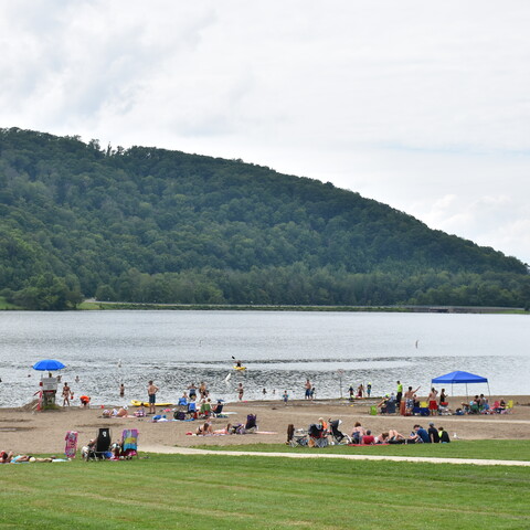 Swimmers and beach goers at Quaker Lake Beach